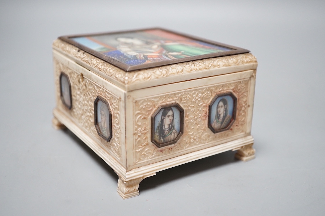 A Company School ivory box, India, 19th century 7.5cm high, 12cm long, 9.5cm wide, inset with miniatures of royalty